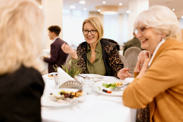 istock Senior female friends having breakfast at a hotel 1441335148