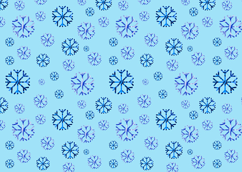 Seamless pattern of snowflakes of different sizes on a blue background. Winter design. Christmas decorations.