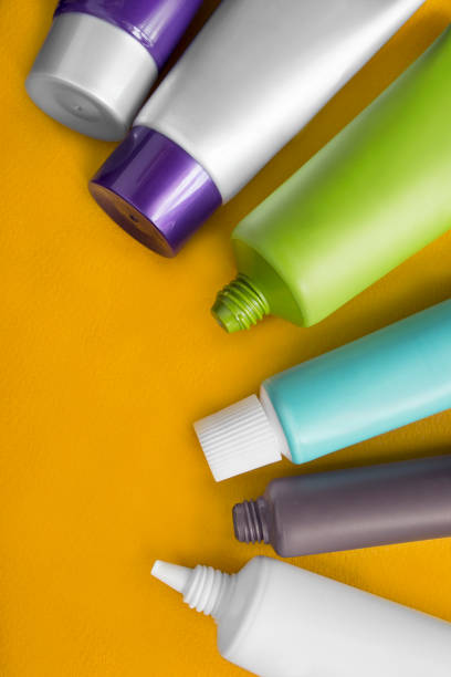 istock Cosmetic tubes on yellow 1441343499