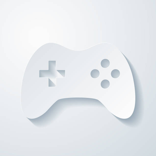 kontroler gier. ikona z efektem cięcia papieru na pustym tle - three dimensional shape joystick gamepad computer icon stock illustrations