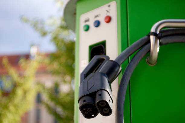 istock Car charging station close-up. Environmentally friendly energy. 1441344818