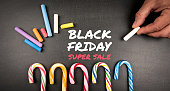 Black Friday Super Sale. Text on black chalk board