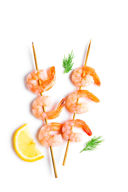 istock Shrimp skewers isolated on white background 1441345539