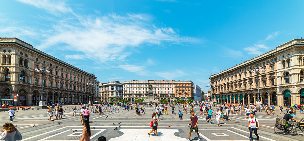 Milano, Italy - July 3, 2019: Piazza del Duomo or Duomo Square. Duomo di Milano Cathedral, Galleria Vittorio Emanuele II and Equestrian Statue. Milano, Italy.