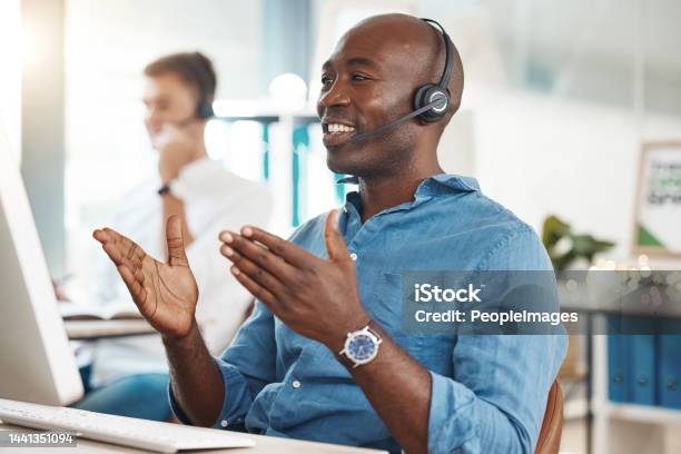 Call Center Telemarketing And Customer Service With A Business Man Working In An Office And Consulting On A Headset Help Crm And Contact Us With A Black Male Consult At Work On A Computer Stock Photo - Download Image Now