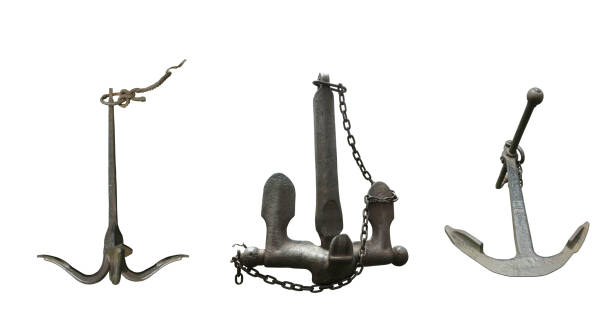 istock Iron black old rusty naval anchor isolated over white background 1441351646