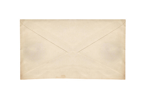 Golden paper envelope isolated on pink background. top view