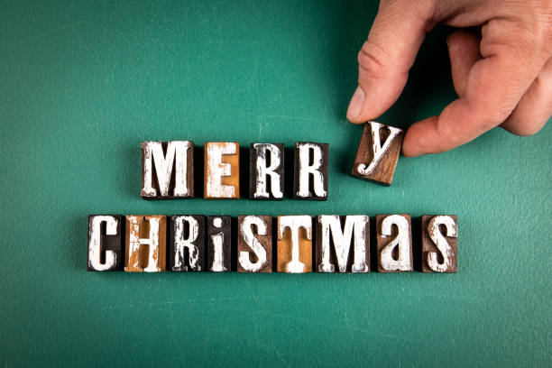 istock Merry Christmas. Holiday concept. Text on a green chalk board 1441353987