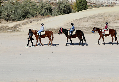 Goreme, Nevsehir, Turkey-November 05,2022 :Unidentified Children enjoying Horse Ride in Cappadocia