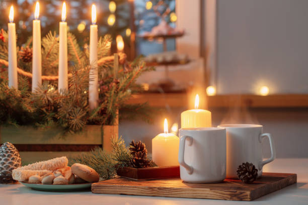 istock white cups with hot drink and christmas decorations at home 1441354170