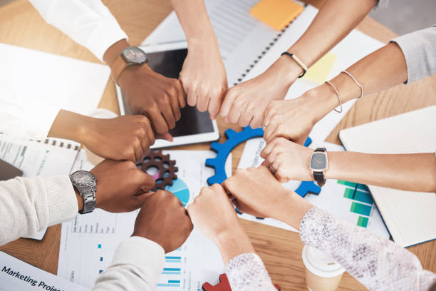 istock Acounting team, collaboration and hands for collaboration, teamwork and diversity during meeting for motivation, planning and management meeting, Crm and data analysis men and women in unity 1441356233
