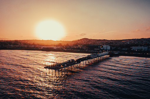 Sunset over Paignton Pier in Devon