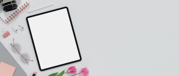 istock Beautiful feminine workspace in white and pink style with tablet mockup and copy space 1441356826