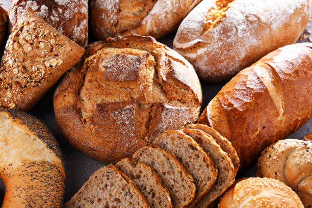 istock Assorted bakery products including loafs of bread and rolls 1441357455