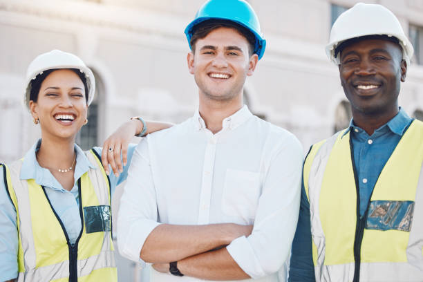 istock Logistics worker, architect and manager portrait working on construction site, happy with architecture partnership and smile for engineering job. Team diversity in industrial maintenance industry 1441358995