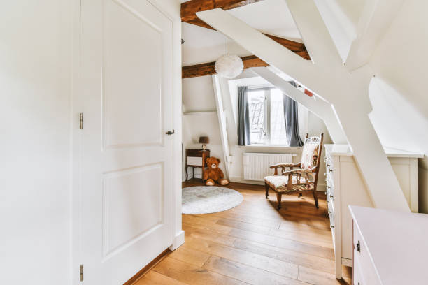istock A small bright room with a large window and an armchair 1441361132