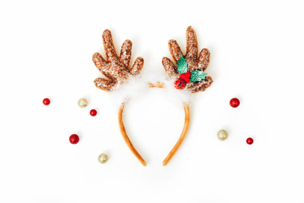 istock Christmas composition. Christmas headband and balls on white background. Flat lay, top view. 1441364379