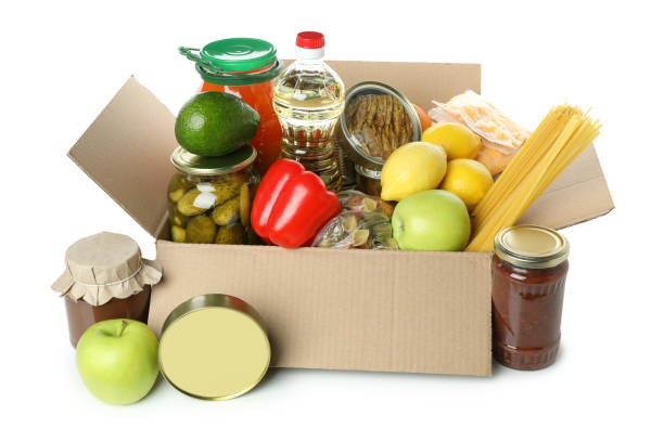 istock Donation box with food isolated on white background 1441367625