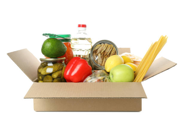 istock Donation box with food isolated on white background 1441368856