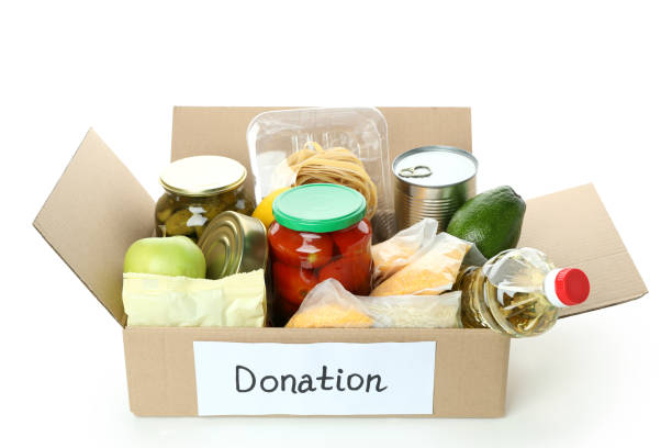 istock Donation box with food isolated on white background 1441369055