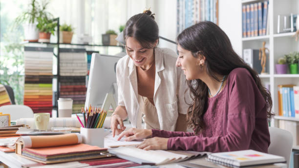 istock Young designers working together in the office 1441371295