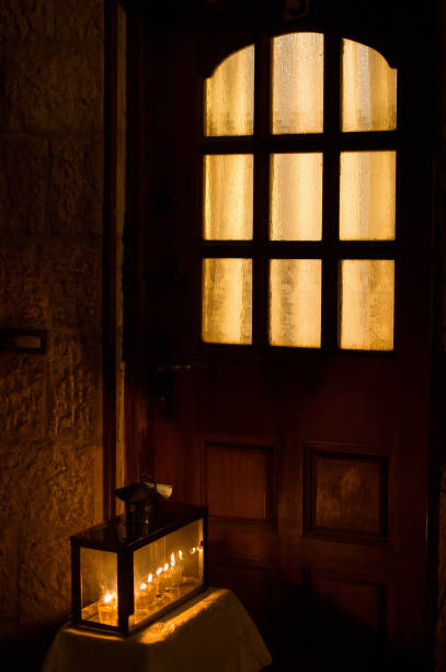 istock Glowing Hanukkah menorah beside an arched doorway 1441372568
