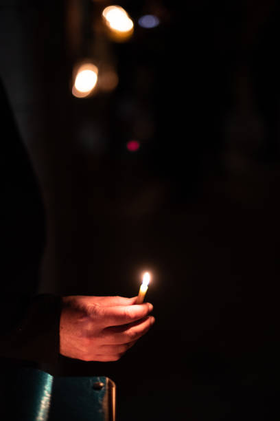 istock Lighting the Hanukkah menorah 1441372645