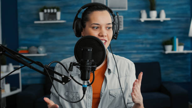 istock Cheerful famous internet show host ending live broadcast 1441374737