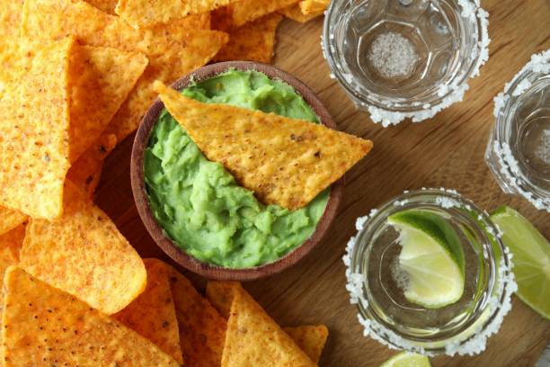 istock Party concept with tequila, guacamole and chips 1441378778
