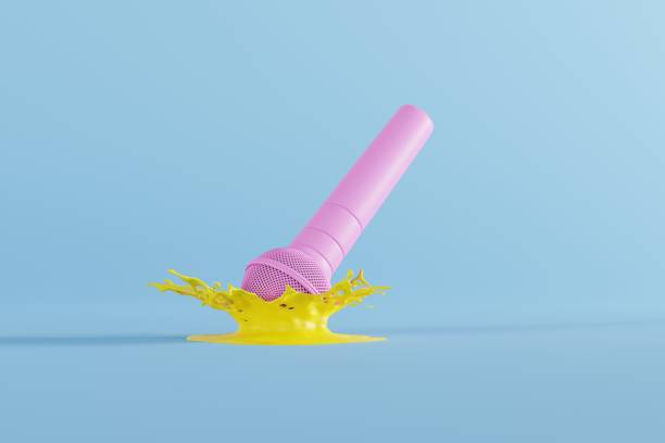 istock A microphone falling to the ground in a splash of water. 1441378933