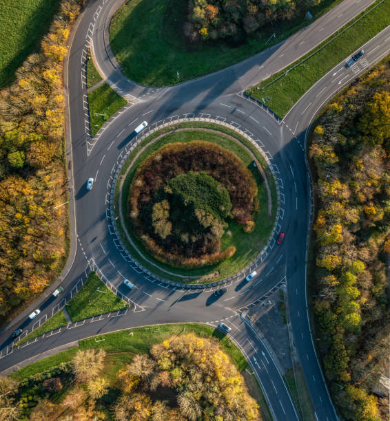 Roundabout, UK. Aerial photo from a drone of an autumnal coloured roundabout in Great Notley, Braintree, Essex, UK. This photo was captured in November 2022. This roundabout connects the A131 to London Road. braintree essex photos stock pictures, royalty-free photos & images