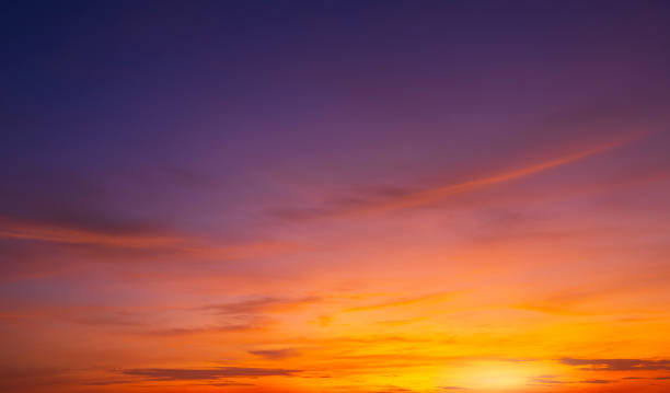 istock Colorful dusk sky background after sundown with beautiful orange sunlight clouds on blue twilight sky 1441383875