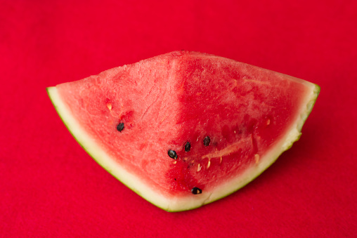 Watermelon on red background.