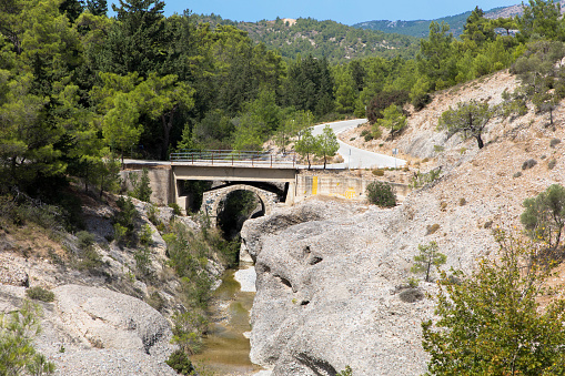 Panoramic views of the Blue Mountain River and Stone Bridge. Near the Gadouras Dam. In the south of the island of Rhodes. Dodecanese Greece