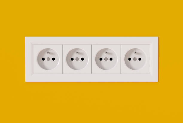 istock Electric sockets on a yellow background. 1441387970