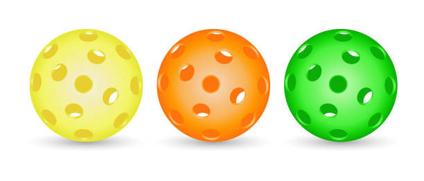 bright multicolored pickleball balls - pickleball stock illustrations