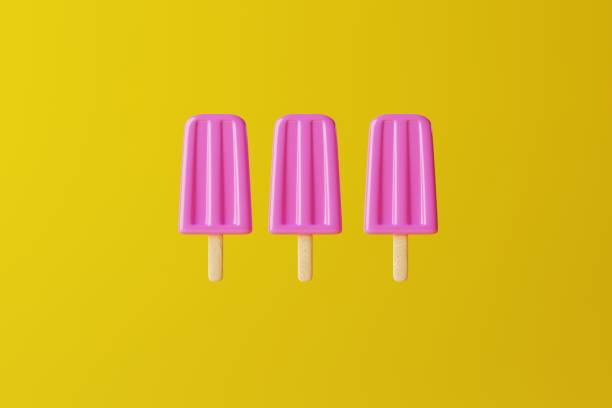 istock Pink ice lolly on an orange background. 1441389629