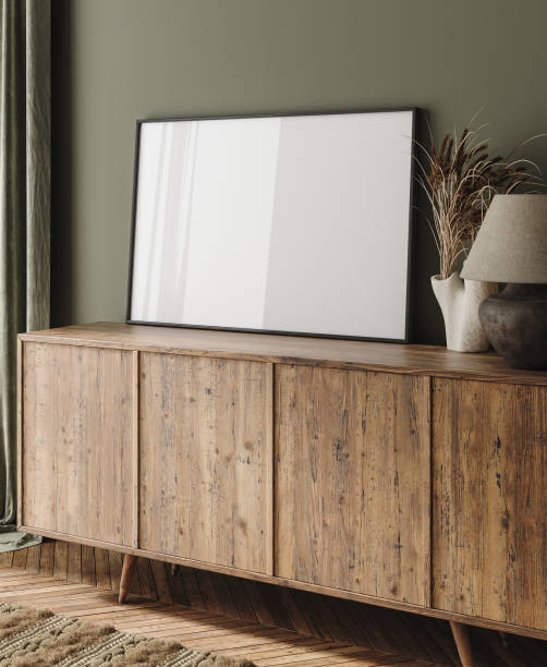 istock Frame mockup on commode with decor in living room interior 1441389868