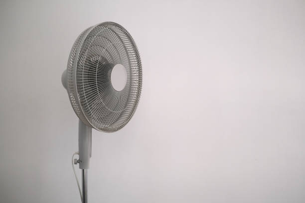 istock electric fan on white background close-up 1441393931