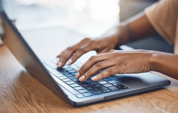 istock Black woman hands, student and laptop typing, keyboard and studying for research, elearning and internet college course, online class and blog planning. Closeup person, work from home and email tech 1441395328