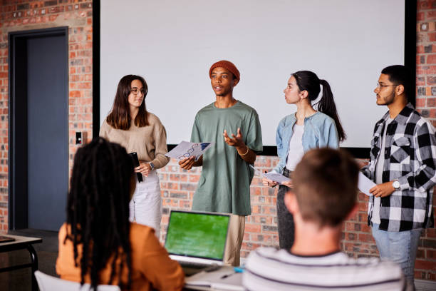 istock Group of students giving a presentation during a school class 1441395670