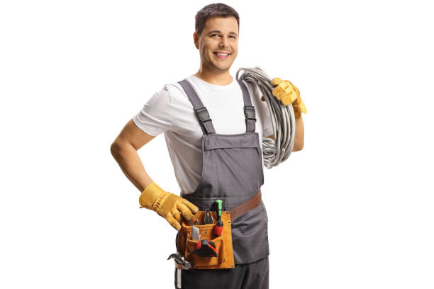 istock Electrician carrying cables on his shoulder and smiling 1441402982