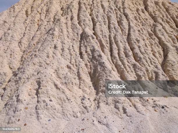 Surface Of Sand Pile Washed By Rain Drops Stock Photo - Download Image Now - Color Image, Construction Site, Grooved