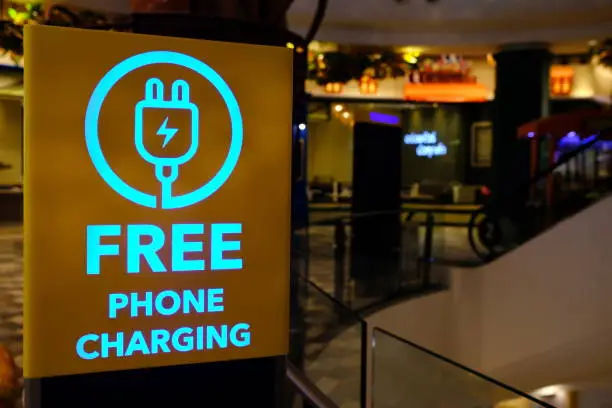 Photo of Free Phone Charging Sign in Department Store.