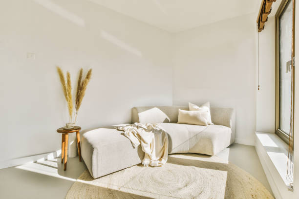 istock A small living room with a soft sofa and pillows 1441412535