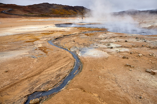 Boiling mud pools at Hverir Geothermal Area in North Iceland