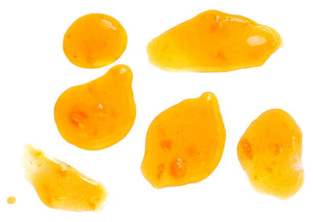 istock Orange fruit  jam isolated on white background, top view. Pattern. Orange or mandarine spread  Flat lay collectin 1441412710