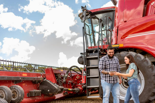 istock Agronomist and farmer using digital tablet in wheat plantation 1441414173
