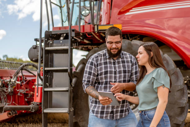 istock Agronomist and farmer using digital tablet in wheat plantation 1441414175