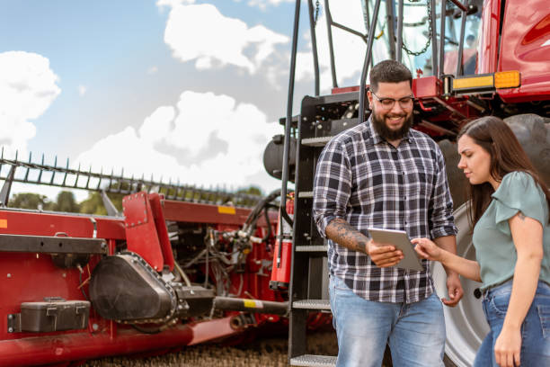 istock Agronomist and farmer using digital tablet in wheat plantation 1441414191